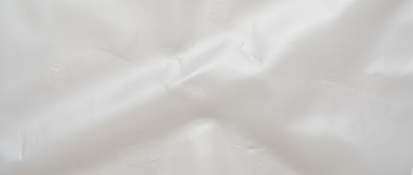 White polypropylene sheet surface texture. Soft folds on flexible plastic film