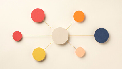 Fototapeta premium Colorful paper circles connected by lines forming a network diagram on beige
