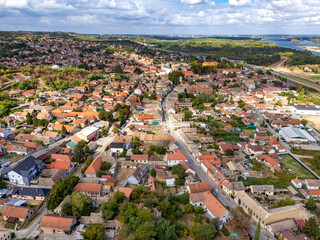 Fototapeta premium Aerial view shows the historic town of Sremski Karlovci in Serbia, situated alongside the Danube River