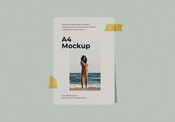 A4 Poster Mockup Taped to Wall with Yellow Masking Tape