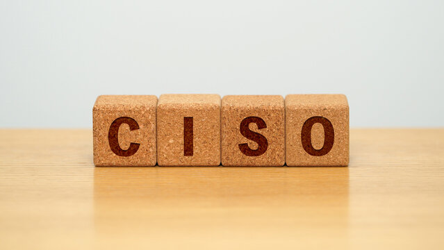CISO on four cork wooden blocks - Chief Information Security Officer concept