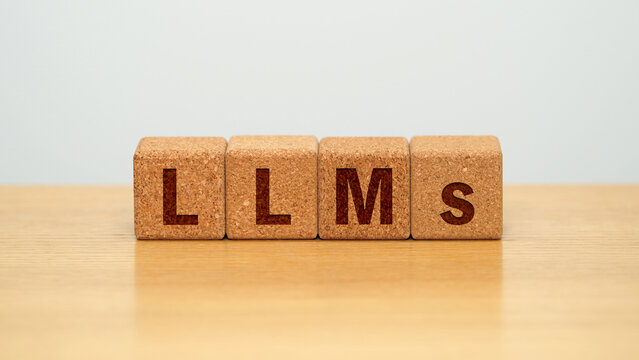 LLMs on four cork wooden blocks - large language models and generative AI concept