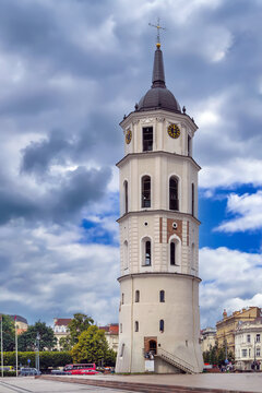 Vilnius Cathedral Bell Tower in Vilnius, Lithuania, viewed from a low angle. Part cloudy sky over classicist architecture