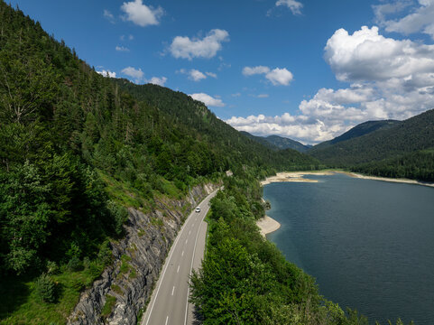 Aerial View of Sylvenstein Reservoir with Low Water Levels During Summer Drought, Bavaria, Germany