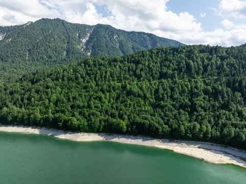Aerial View of Sylvenstein Reservoir with Low Water Levels During Summer Drought, Bavaria, Germany