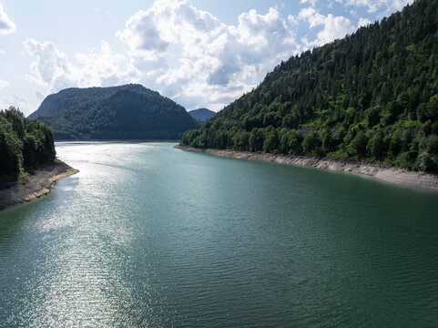 Aerial View of Sylvenstein Reservoir with Low Water Levels During Summer Drought, Bavaria, Germany