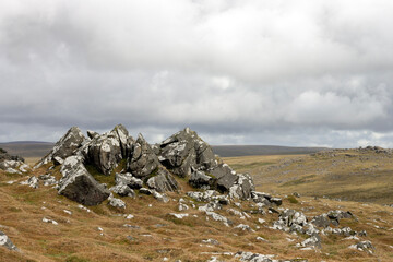 mountain landscape with clouds, tor in dartmoor © Charlotte