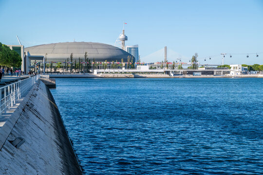 View of the modern architecture of Parque das Nacoes, including the Altice Arena and Vasco da Gama Tower along the Tagus River in Lisbon, Lisbon, Portugal.