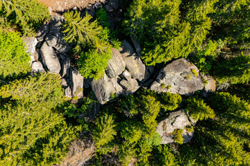 Aerial view of Granodiorite rock formation with visible signs of weathering and erosion known as Markov kamen. Markov Kamen famous rock in between the trees on the Kopaonik mountain in Serbia © nedomacki