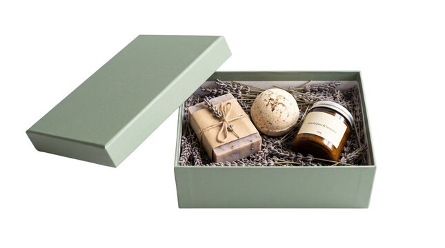 Eco-friendly spa gift box with handmade soap and candle, organic wellness care package in sage green box, natural self-care beauty set isolated on white