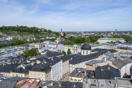 View of the city of Salzburg from Kapuzinerberg with Trinity Church and Mirabell Palace, Salzburg, Austria
