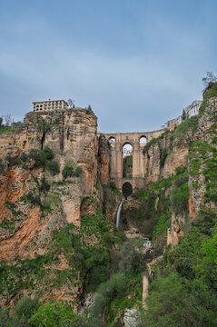 Famous Puente Nuevo, a stone bridge spanning the gorge with lookout offering views, located in Ronda, Spain