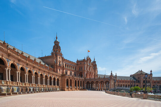 The majestic Plaza de Espana captured on a sunny day, located in Maria Luisa Park in Seville, Spain