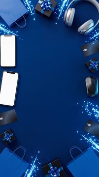 Cyber Monday promotional flat lay with smartphones, headphones, gift boxes, shopping bags and blue lights on dark blue background