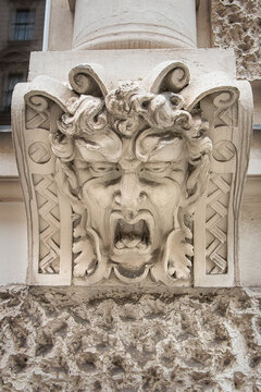 Close-up of a faun's face. Building decoration in Vienna, Austria