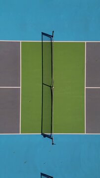 Aerial top down view of pickleball or tennis courts with nets and surface lines