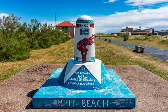Utah Beach, Normandy, France - 10 June 2026: View of the historic Voie de la Liberte marker, a memorial commemorating the Allied landings in Normandy, set against a grassy landscape.