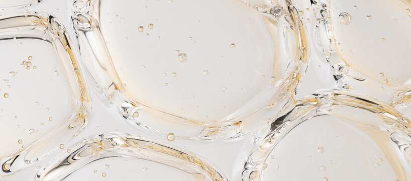 Macro texture of transparent cosmetic gel bubbles with hyaluronic acid and collagen serum, pure moisturizing skincare background, 3D render.
