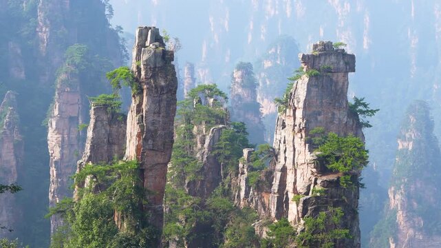 Sandstone peaks rising above forest in Zhangjiajie China