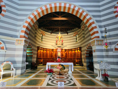 Geraldton, Australia - 29 December 2025: View of St Francis Xavier's Cathedral interior featuring the altar, distinctive striped walls, and wooden paneling under a vaulted ceiling.