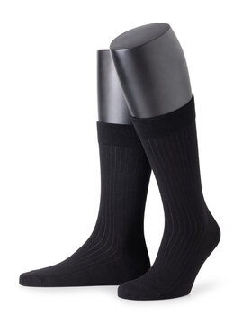 A pair of black classic men's striped socks on a mannequin isolated on a white background