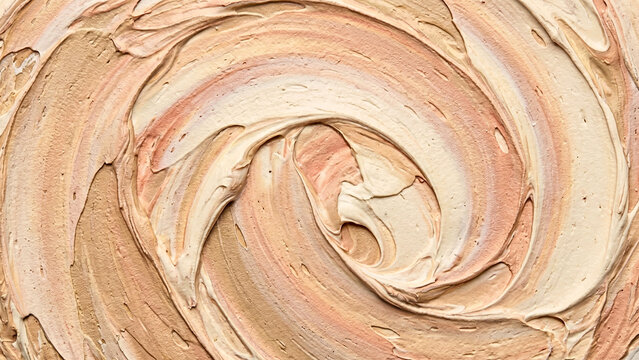 Textured beige makeup foundation background with swirls