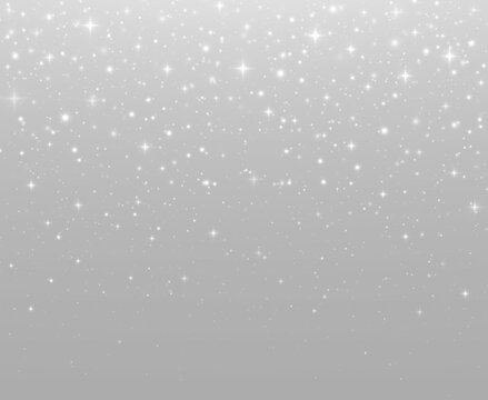 Christmas glitter background with scattered stars and luminous sparkle effects.