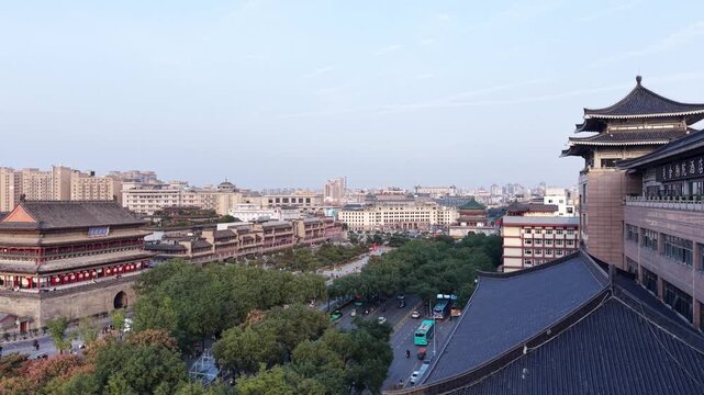 Aerial drone footage of the Bell Tower in Xi'an, China, on a sunny day, 1-inch sensor