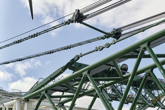 Thisted, Denmark - 11 August 2026: View of the BMS Heavy Cranes 3000 ton electric ring crane with steel lattice structures, pulleys, and cables at the National Test Center in Osterild.