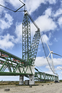 Thisted, Denmark - 11 August 2026: View of the BMS Heavy Cranes 3000 ton ring crane, an electric Huisman crane, at the National Test Center for Large Wind Turbines in Osterild, Denmark.