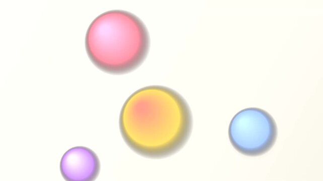 Minimalist motion graphics of colorful spheres moving
