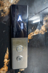 Elevator control panel with illuminated button in building © IbragimovN