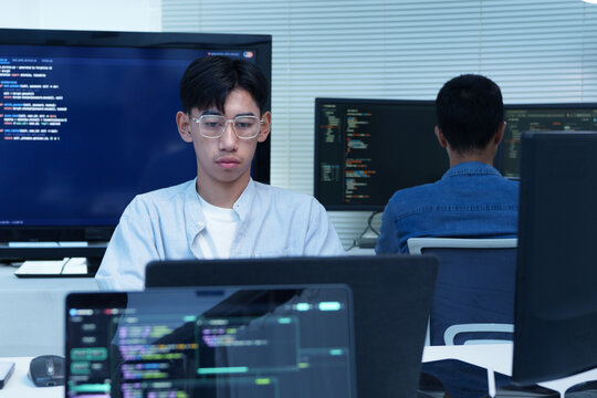 Programmer Developing Digital Software with Code