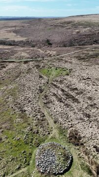 Drone flight over cairn to Barbrook I stone circle on Derbyshire moor