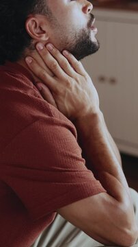 Frustrated, man and anxiety in home with stress, bad decision and emotional distress of past trauma. Thinking, male person and overwhelmed at house with inner conflict, personal crisis and rumination