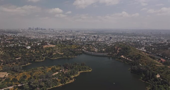 Los Angeles California Aerial v277 flyover hills capturing panoramic views of the reservoir, downtown cityscape and surrounding neighborhoods - Shot with 5k Camera - May 26th 2024