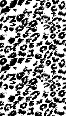 Seamless black and white leopard skin pattern texture background © SUNAKKO