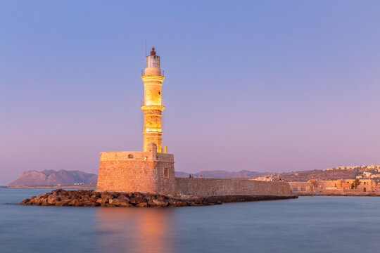 Chania Lighthouse at Sunrise in Old Venetian Harbor, Crete, Greece