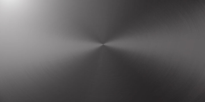 Dark metallic circular brushed metal surface with radial light flare circular texture metallic background radial pattern steel texture polished metal abstract background industrial