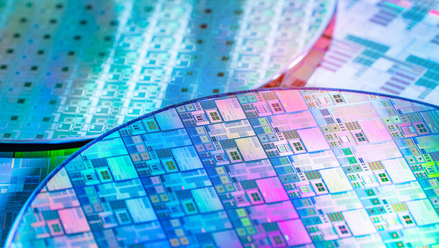 silicon wafer for manufacturing semiconductor of integrated circuit.Electronic circuit designs have been built onto the wafers using micromaching including photolithography