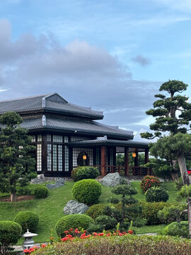 Traditional Japanese building set in a landscaped garden