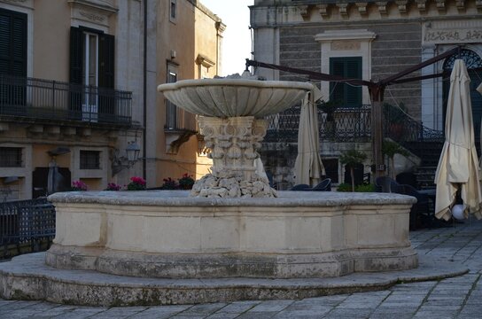 Piazza Duomo Fountain, located along the distinctive sloping square in the heart of Ragusa Ibla.