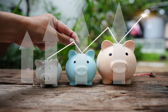Hand Holding Glowing Light Bulb with Green Energy and Environmental Icons
