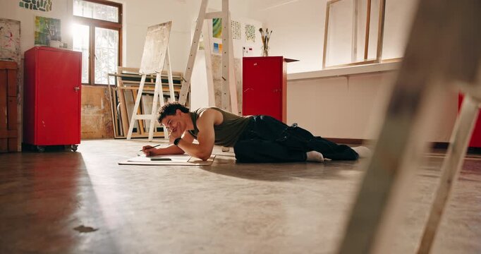 Phone, artist and thinking for art in studio, creativity and technique with online inspiration. Man, pencil or tech for artistic vision, talent and design process for artwork with digital drawing