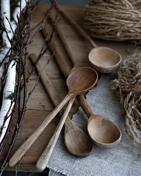 Handmade wooden spoons display natural craft work on rustic wooden table