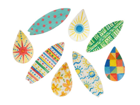Painted decorative wooden surfboard and droplet shapes with vibrant patterns isolated on transparent