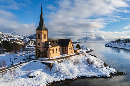 Vagan Kirche church with steeple and snow-covered landscape