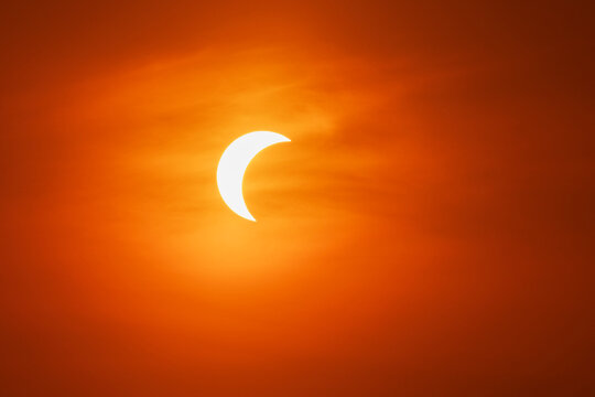 Partial solar eclipse over valldemossa, Mallorca, Spain