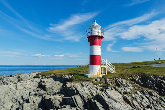 Green Point Lighthouse on rocky coast in port de grave, Newfoundland