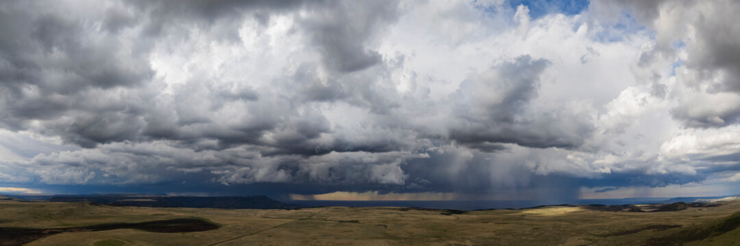 Storm clouds and rain over johnson mesa